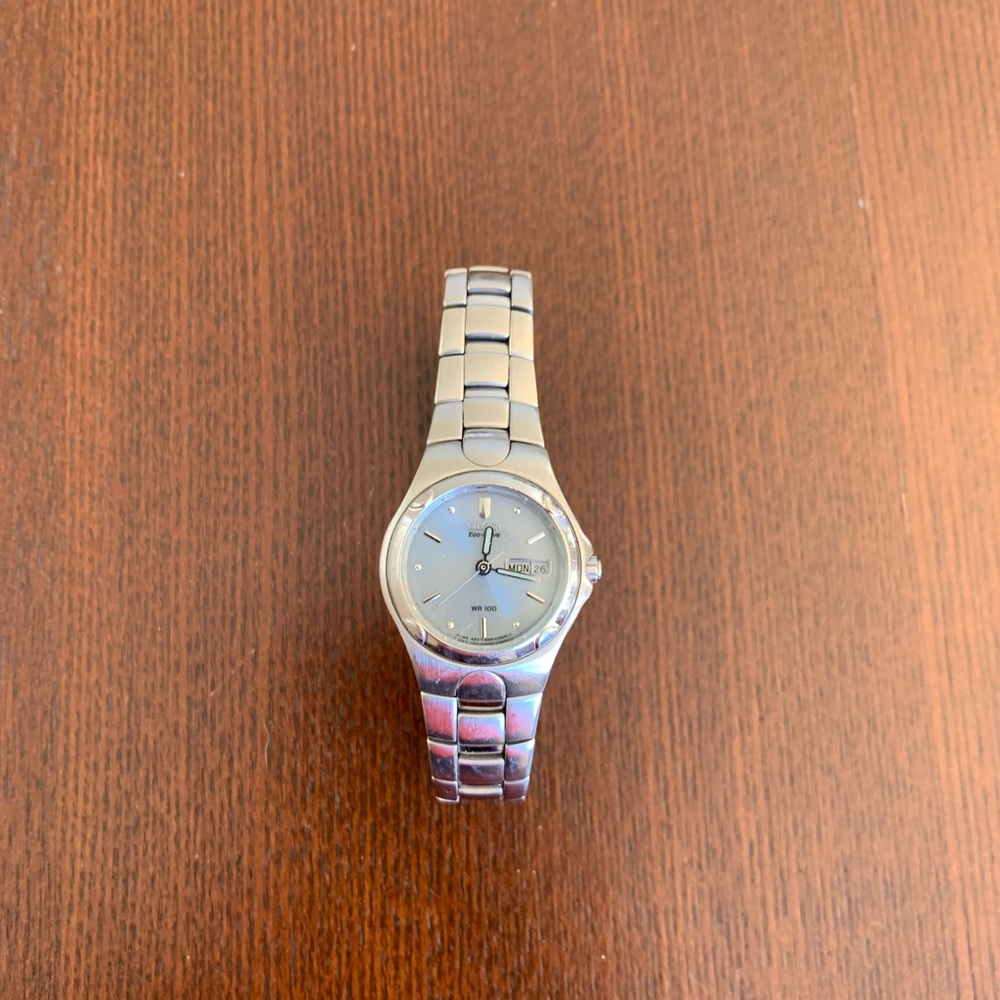 Women’s Citizen eco-drive watch. Sterling silver. Light blue-grey face.